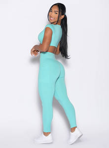 Dernier modèle de leggings de yoga à taille élastique avec poches latérales Leggings taille haute avec scrunch pour les fesses Leggings de sport et d'entraînement - Product Image 4