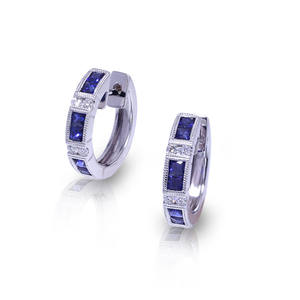 Boucles d'oreilles créoles princesse et diamant naturel rond avec détails milgrain en or 18 carats 0.08 carats certifiés IGI pour un usage quotidien - Product Image 1