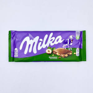 Chocolate Sólido con Nueces Milka (Austria) 100g, Chocolate Blanco con Sabor a Swirl, 100% Chocolate, Venta al Por Mayor - Product Image 2