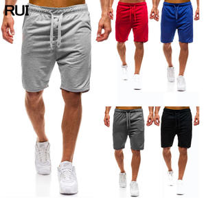 Shorts de sport et de gym grande taille pour hommes, shorts de course de poche en coton pour le sport - Product Image 1