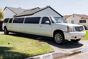 CHEVROLET SUBURBAN LIMOUSINE 2003 D'OCCASION CÔTÉ GAUCHE/CÔTÉ DROIT - Product Image 2