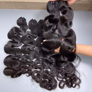 Extensiones de cabello chino tejido crudo de alta calidad profesional OEM textura ondulada del cuerpo varias longitudes fabricadas en Vietnam - Product Image 2