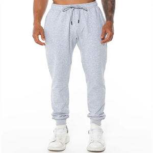 Pantalones de chándal ajustados informales para hombre mezcla de LICRA y algodón de alta calidad color sólido rasgado recién llegados servicio OEM al por mayor - Product Image 1