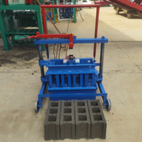 Petite machine portable de fabrication de briques creuses pour usage domestique, très demandée au Nigeria