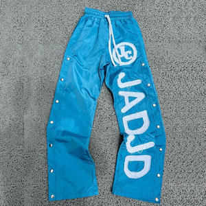 Fabricantes de ropa personalizada, ropa de calle, cortavientos de pierna ancha, pantalón de sudor holgado, botón a presión lateral, pista Appqiue desgastada - Product Image 3