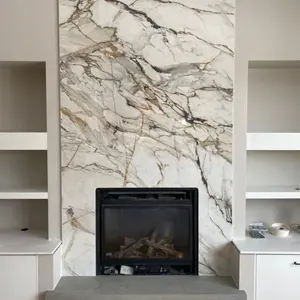 Vendita calda resistente al calore e facile da pulire camino da parete in marmo Surround pietra naturale e sinterizzata per soggiorno