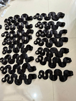 Vente en gros 100% paquets de cheveux humains ondulés bruts paquets de cheveux bouclés vietnamiens trame de cheveux bouclés ondulés bruts non traités