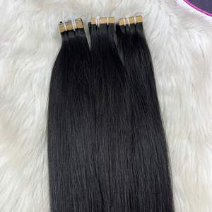 Vente en gros TAPE HAIR Cheveux naturels droits Grand stock Cheveux humains vierges 100% de haute qualité Cheveux bruts vietnamiens pour toutes les couleurs - Product Image 2