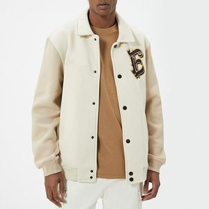 OEM Manufacturer's Custom Logo Men Varsity Jacket High-Demand High-Street Stand Collar Front Logo Placement Plain Dyed Canvas - Product Image 1