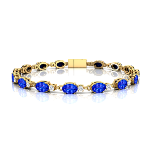 Conception à la mode exquise or 14 carats 2.2mm taille ovale tanzanite naturelle avec de vrais diamants délicats bracelets de tennis élégants en gros - Product Image 1