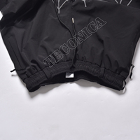 Pantalon de ski noir imperméable et coupe-vent imprimé, motif toile d'araignée réfléchissant, doublure chaude, poignets élastiques pour le ski et la neige - Vente en gros