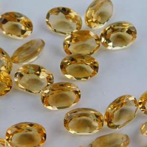 พลอยซิทรินสีเหลืองธรรมชาติทรงรีขนาด 3x5 มม. แบบเจียระไนเหลี่ยมเพชรพลอย สำหรับทำเครื่องประดับ ผลิตในอินเดีย โดยบริษัท Kiran & Sons Gems Co - Product Image 1