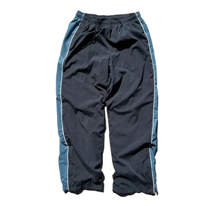 กางเกงไนลอนทรงแบ็กกี้รุ่นใหม่ ปี 2026 เอวยางยืด ปรับได้ มีซิปและกระดุมปิดด้านล่าง มีกระเป๋า ขากว้าง สีดำ - Product Image 1