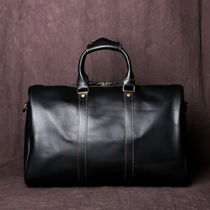 OEM/ODM Sac polochon en cuir véritable de grande capacité avec fermeture à glissière Motif de lettres à la mode pour les voyages Cadeaux promotionnels Europe - Product Image 1