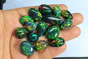 Merveilleux cabochon d'opale noire éthiopienne forme ovale brillant arc-en-ciel flashy pierre précieuse d'opale noire éthiopienne au prix de gros - Product Image 5