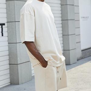 Traje informal de moda de alta calidad para hombres y mujeres, pantalones cortos de manga corta de algodón de verano con una camiseta de 2 piezas para hombres - Product Image 1