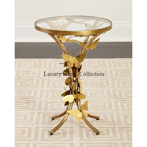 Centre en métal de conception de feuille de couleur or et table d'appoint avec des pieds de conception de papillon de forme ronde supérieure en verre transparent pour la table - Product Image 1