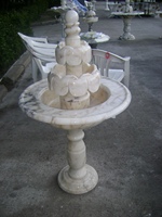 2025 sculpté à la main en travertin marbre jardin fontaine d'eau Style moderne turc avec des modèles décoratifs naturels en pierre Antique