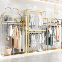 Porte-vêtements de luxe en acier inoxydable doré de haute qualité, support de présentation pour boutique avec base en MDF imitation marbre
