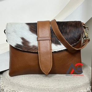 Nouveau véritable cuir de vachette naturel fourrure cuir fronde sac à main Western peau de vache fourrure cuir bandoulière élégant multi-usages sac à main pour les femmes - Product Image 1