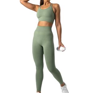 Conjuntos de Fitness para gimnasio de alta calidad para mujer superventas, equipo de Yoga sin costuras con decoración cruzada, tela transpirable - Product Image 1