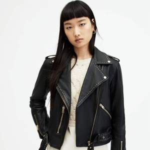 Custom Wholesale Women's Black Studded PU <b>Leather</b> Jacket Slim Fit Biker Moto Punk Rock Gold Zipper <b>Rivet</b> Motorcycle Coat - Product Image 1