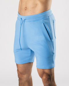 กางเกงขาสั้นผู้ชายผ้าฟลีซคุณภาพสูงขายส่ง ระบายอากาศได้ดี ผลิตจากผ้าฝ้าย 100% ลายเรียบ สไตล์ลำลองแนวสตรีท เอวยางยืด รับผลิตตามแบบ - Product Image 1