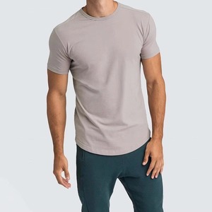 เสื้อยืดแขนสั้นผ้าแคนวาสไซส์ใหญ่พิมพ์ลายโลโก้ด้านหน้า ผ้าฝ้าย 100% สีและขนาดตามสั่ง - Product Image 1