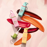 Porte-clés créatif en forme de tube de brillant à lèvres, mini flacon vide en plastique avec porte-clés, logo personnalisé, emballage mignon pour baume à lèvres cosmétique