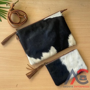 Conjunto de mujer con bolsa y cremallera de piel de vaca de nuevo diseño OEM 2024 al por mayor - Product Image 1