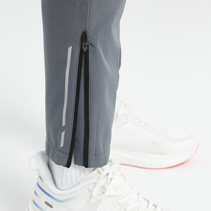 กางเกงกีฬาผ้าแคนวาสผู้ชาย ผลิตจากโรงงาน ดีไซน์ทันสมัย สไตล์สตรีทแวร์ มีกระเป๋าพิมพ์ลาย ระบายอากาศได้ดี เป็นมิตรกับสิ่งแวดล้อม ผลิตจากโพลีเอสเตอร์ 100% สวมใส่สบาย - Product Image 5