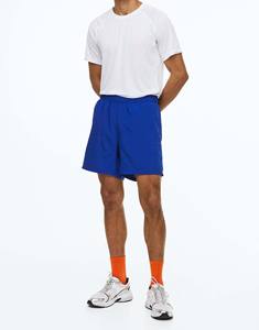 กางเกงขาสั้นสำหรับวิ่งออกกำลังกายกีฬาฤดูร้อนแบบลำลองของผู้ชายป้องกันรอยยับสบายโลโก้สีทึบยืดหยุ่นได้ - Product Image 1