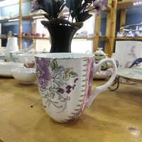 Vente en gros de tasse en céramique de nouveau style de haute qualité en porcelaine de conception de fleur tasse à café tasse à thé