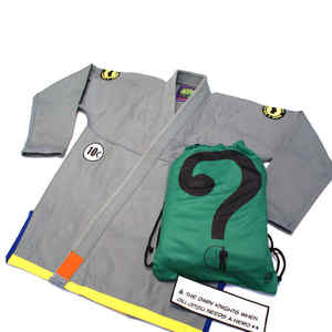 เครื่องแบบ JJ GI Jitsu จากผ้าฝ้ายคุณภาพสูงออกแบบลายปักโลโก้ตามสั่ง - Product Image 1