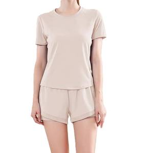 Conjunto de Yoga sin costuras de 2 piezas con logotipo personalizado para mujer, primavera 2024, mallas con forma de espalda de cintura alta, pantalones cortos, Sujetador deportivo con espalda cruzada de talla grande - Product Image 3