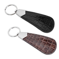 Vente en gros Porte-clés en cuir Logo personnalisé Porte-clés chausse-pied en cuir PU