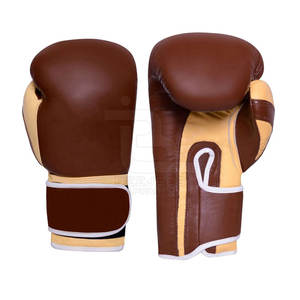 Guantes de boxeo impermeables de cuero de alta calidad para entrenamiento y kick boxing Cierre de gancho y bucle Tamaños personalizables - Product Image 1