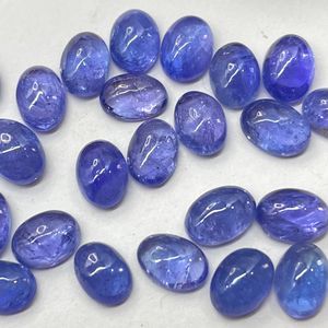Vente en gros cabochon en tanzanite naturelle 7x9mm taille ovale calibrée pierre précieuse bleue avec traitement thermique pour la fabrication de bijoux - Product Image 5