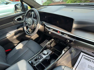 Kia Sorento hybride SX Prestige AWD 2025 bleu éclatant, d'occasion, avec toit ouvrant, démarrage à distance, sièges en cuir, boîte automatique, jantes en alliage - Product Image 5