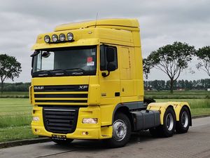 Camion tracteur DAF XF 104 6x4 d'occasion 2011, conduite à gauche, Euro 5, moteur diesel Cummins, transmission automatique, suspension pneumatique robuste - Product Image 1