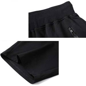 กางเกงขาสั้นออกกำลังกายผู้ชายราคาถูกปี 2025 แห้งเร็ว มีเชือกผูก เอวสองชั้น ระบายอากาศได้ดี สวมใส่สบาย ผ้าฝ้าย 100% สีพื้น สำหรับวิ่งจ๊อกกิ้ง - Product Image 6