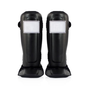 Protège-tibias et protège-pieds réglables pour le kickboxing, protection noire pour les pieds, couvre-pieds d'entraînement pour les arts martiaux. - Product Image 1
