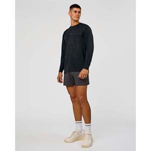 เสื้อยืดแขนยาวทรงโอเวอร์ไซส์สีดำ พร้อมโลโก้ด้านหน้าแบบวอช - Product Image 2