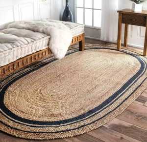 Alfombras y juegos de alfombras ovaladas personalizables estilo granja moderna Alfombra trenzada de Yute natural con aspecto rústico - Product Image 1