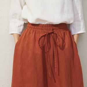 กระโปรงแฟชั่นผ้าลินินสีแดงอิฐแบบลำลองกระโปรง Midi ผ้าลินินแบบลำลองกระโปรงเอวยางยืดสำหรับผู้หญิงปรับแต่งได้พร้อมกระเป๋าขนาดใหญ่ - Product Image 4