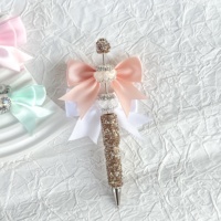 Stylo à bille de luxe avec nœud en strass, cœur en cristal et pavé de diamants, ensemble d'accessoires perlés faits à la main, cadeau pour l'école et le bureau, vente en gros
