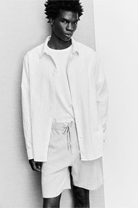 Pantalones cortos informales de alta calidad para hombre, ajuste Regular, mezcla de lino y algodón, tela texturizada, cordón elástico en la cintura, lado diagonal - Product Image 6