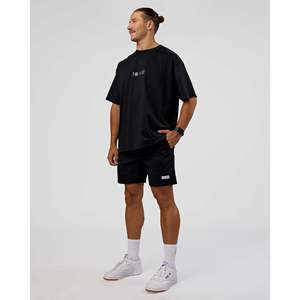 เสื้อยืดโอเวอร์ไซส์ทรงใหญ่พิเศษสำหรับทุกเพศ สีดำ-ขาว สไตล์สตรีท พิมพ์ลายซิลค์สกรีน ระบายอากาศได้ดี - Product Image 6