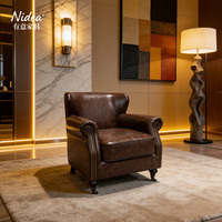 Fauteuil Club Vintage en Cuir Marron Vieilli Fait Main, Style Britannique Antique, avec Roulettes Métalliques pour Salon et Hôtel