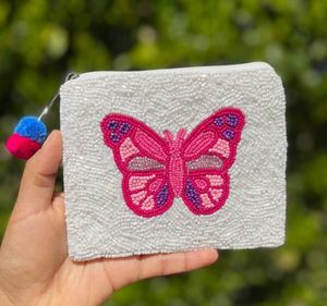 Porte-monnaie cousu à la main avec des motifs traditionnels, idéal pour les cadeaux de festivals ou pour ajouter du style à votre look de tous les jours - Product Image 2